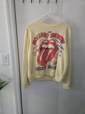 the Rolling Stones Cream Crewneck with Black Script Logo